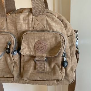 Kipling Beige Bag. Great for travel.